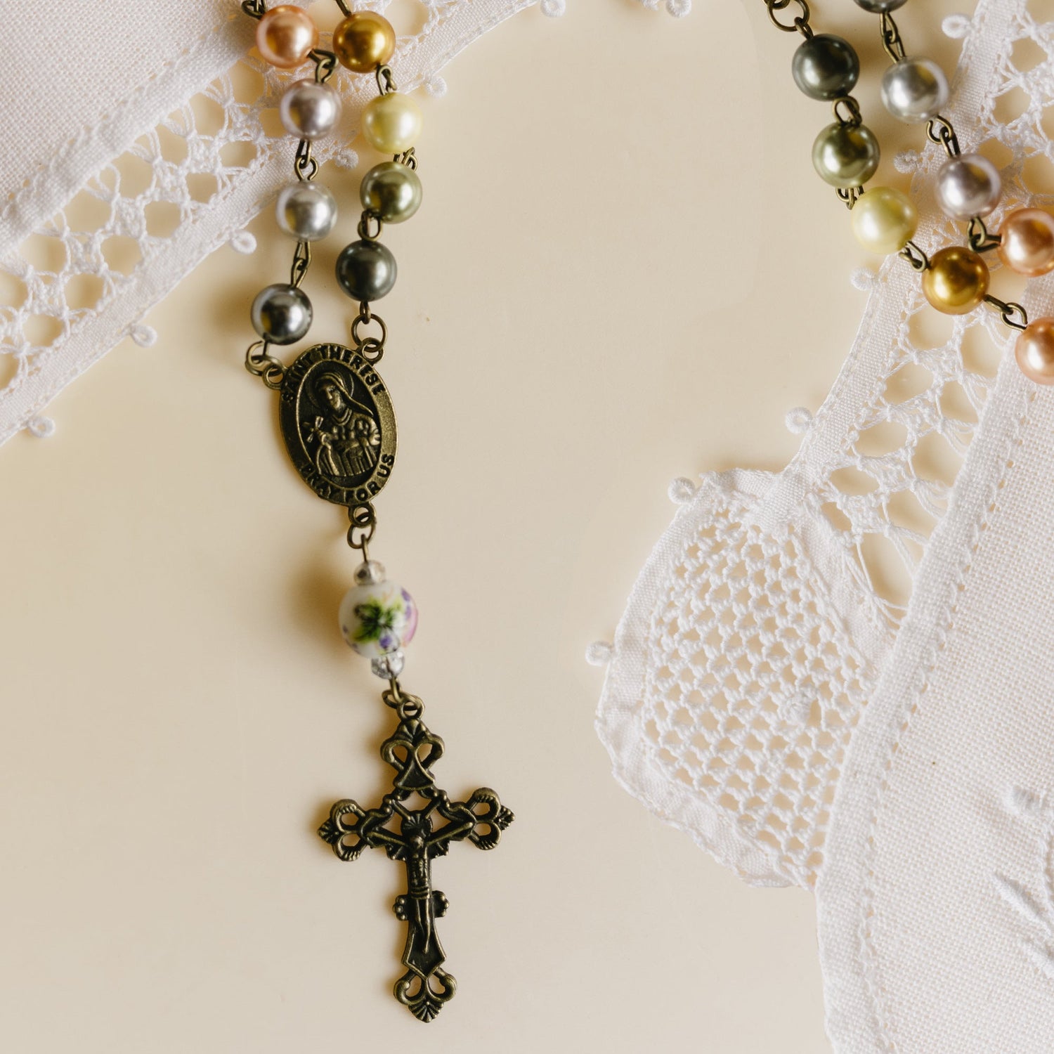 Handcrafted patron saint rosaries featuring meaningful medals and beads. Perfect for prayer, Catholic gifts, and honoring your favorite saint.