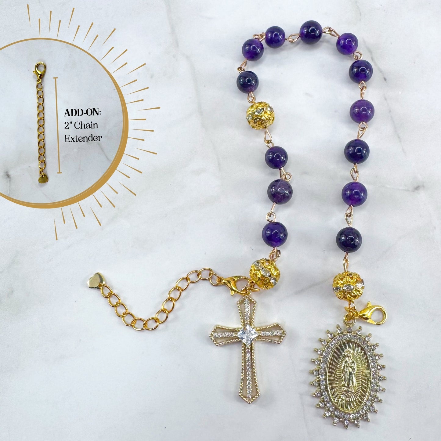 Handmade Catholic rosary bracelet with amethyst beads, sparkling gold cross, and Our Lady of Guadalupe medal. Perfect for gifts or prayer. Made in Edmonton, AB, Canada.