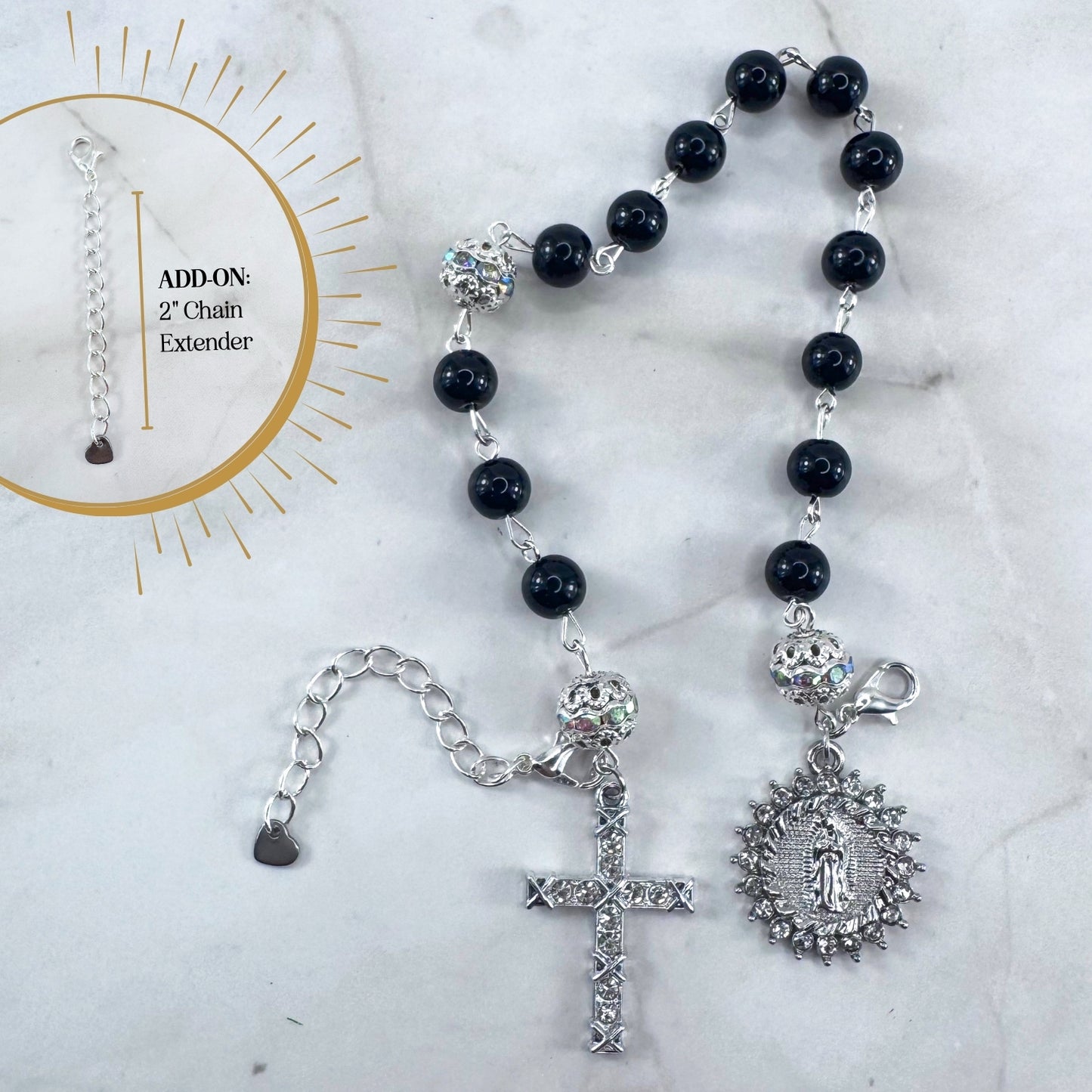 Luxury Catholic rosary bracelet handcrafted with natural black onyx gemstone beads, a silver-tone cross with zirconia accents, and a Lady of Guadalupe medal. Adjustable beaded bracelet perfect for prayer, religious gifts, Confirmation, bridesmaid gifts, or everyday devotion. Made in Edmonton, AB, Canada.