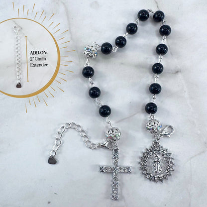 Luxury Catholic rosary bracelet handcrafted with natural black onyx gemstone beads, a silver-tone cross with zirconia accents, and a Lady of Guadalupe medal. Adjustable beaded bracelet perfect for prayer, religious gifts, Confirmation, bridesmaid gifts, or everyday devotion. Made in Edmonton, AB, Canada.
