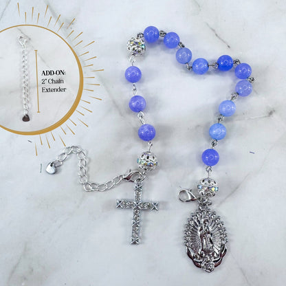 Luxury Catholic rosary bracelet handcrafted with natural Periwinkle Blue Angelite gemstone beads, a silver-tone cross with zirconia accents, and a Lady of Guadalupe medal. Adjustable beaded bracelet perfect for prayer, religious gifts, Confirmation, bridesmaid gifts, or everyday devotion. Made in Edmonton, AB, Canada.
