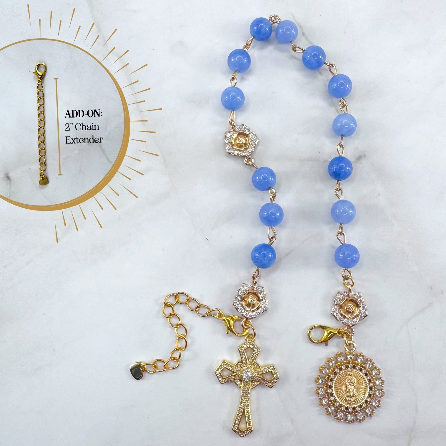 Luxury Catholic rosary bracelet handcrafted with natural blue quartz gemstone beads, a gold-tone cross with zirconia accents, and a Lady of Guadalupe medal. Adjustable beaded bracelet perfect for prayer, religious gifts, Confirmation, bridesmaid gifts, or everyday devotion. Made in Edmonton, AB, Canada.