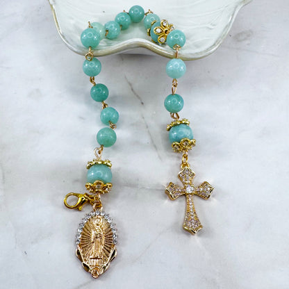 Luxury Catholic rosary bracelet handcrafted with natural Emerald Green Jade gemstone beads, a gold-tone cross with zirconia accents, and a Lady of Guadalupe medal. Adjustable beaded bracelet perfect for prayer, religious gifts, Confirmation, bridesmaid gifts, or everyday devotion. Made in Edmonton, AB, Canada.