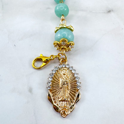 Luxury Catholic rosary bracelet handcrafted with natural Emerald Green Jade gemstone beads, a gold-tone cross with zirconia accents, and a Lady of Guadalupe medal. Adjustable beaded bracelet perfect for prayer, religious gifts, Confirmation, bridesmaid gifts, or everyday devotion. Made in Edmonton, AB, Canada.