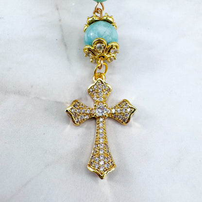 Luxury Catholic rosary bracelet handcrafted with natural Emerald Green Jade gemstone beads, a gold-tone cross with zirconia accents, and a Lady of Guadalupe medal. Adjustable beaded bracelet perfect for prayer, religious gifts, Confirmation, bridesmaid gifts, or everyday devotion. Made in Edmonton, AB, Canada.