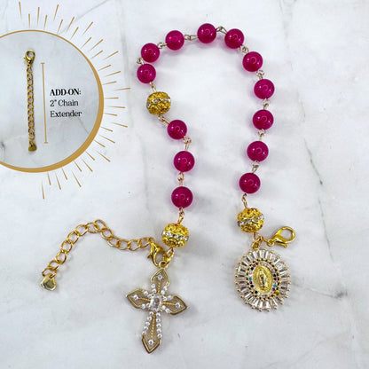 Luxury Catholic rosary bracelet handcrafted with natural Rose Red Chalcedony gemstone beads, a gold-tone cross with zirconia accents, and a Lady of Guadalupe medal. Adjustable beaded bracelet perfect for prayer, religious gifts, Confirmation, bridesmaid gifts, or everyday devotion. Made in Edmonton, AB, Canada.
