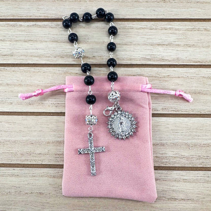 Luxury Catholic rosary bracelet handcrafted with natural black onyx gemstone beads, a silver-tone cross with zirconia accents, and a Lady of Guadalupe medal. Adjustable beaded bracelet perfect for prayer, religious gifts, Confirmation, bridesmaid gifts, or everyday devotion. Made in Edmonton, AB, Canada.