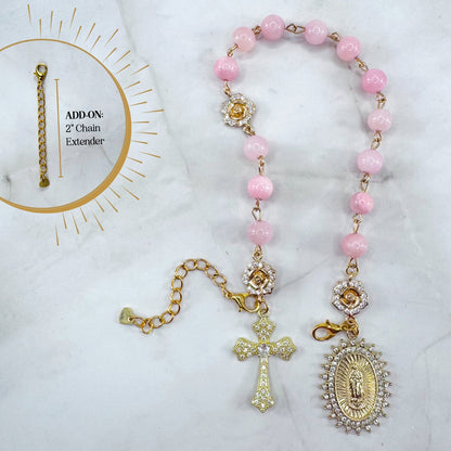 Luxury Catholic rosary bracelet handcrafted with natural rose quartz gemstone beads, a gold-tone cross with zirconia accents, and a Lady of Guadalupe medal. Adjustable beaded bracelet perfect for prayer, religious gifts, Confirmation, bridesmaid gifts, or everyday devotion. Made in Edmonton, AB, Canada.