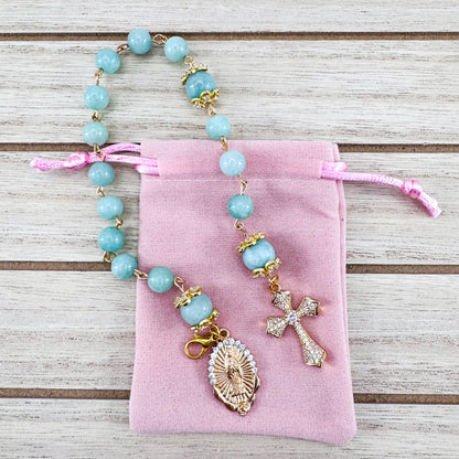 Luxury Catholic rosary bracelet handcrafted with natural Emerald Green Jade gemstone beads, a gold-tone cross with zirconia accents, and a Lady of Guadalupe medal. Adjustable beaded bracelet perfect for prayer, religious gifts, Confirmation, bridesmaid gifts, or everyday devotion. Made in Edmonton, AB, Canada.