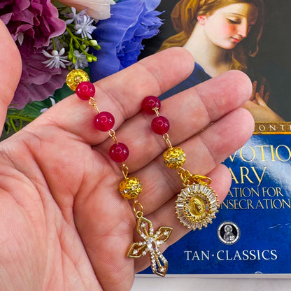 Luxury Catholic rosary bracelet handcrafted with natural Rose Red Chalcedony gemstone beads, a gold-tone cross with zirconia accents, and a Lady of Guadalupe medal. Adjustable beaded bracelet perfect for prayer, religious gifts, Confirmation, bridesmaid gifts, or everyday devotion. Made in Edmonton, AB, Canada.